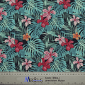The Hawaiian Shirt Floral Palms Scrub Cap by Medicus Scrub Caps features vibrant hibiscus flowers and green palm leaves on a dark blue background. Ruler indicates size.