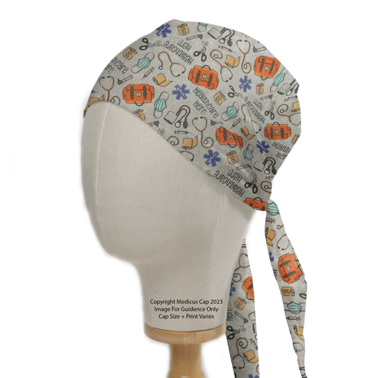 The Healthcare Hero Scrub Cap by Medicus Scrub Caps features vibrant medical-themed patterns like stethoscopes, first aid kits, and heart symbols. Designed for medical professionals, it ties at the back. Text copyrights Medieus Cap 2023.