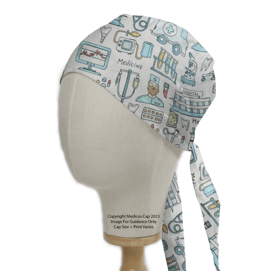 The Hopsital Surgery Large Cartoon Scrub Cap by Medicus Scrub Caps is displayed on a mannequin head, featuring playful blue and white illustrations of stethoscopes, ambulances, and medical equipment. Designed for healthcare settings, this sustainable cap has back ties and printed text.