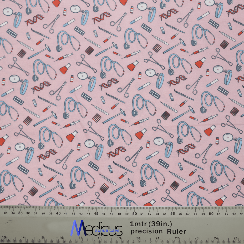The Hospital Tools On Pink Scrub Cap by Medicus Scrub Caps features stethoscopes, syringes, pills, scissors, and DNA strands. Perfect for healthcare professionals. A ruler at the bottom aids measurement with visible branding for easy identification.