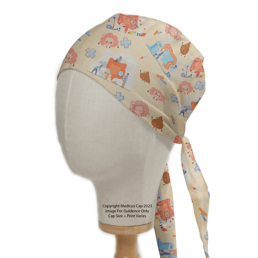 The Human Body Lower GI Intestines Poo Scrub Cap by Medicus Scrub Caps features a playful medical-themed print with intestines, poo, and healthcare icons on beige fabric.