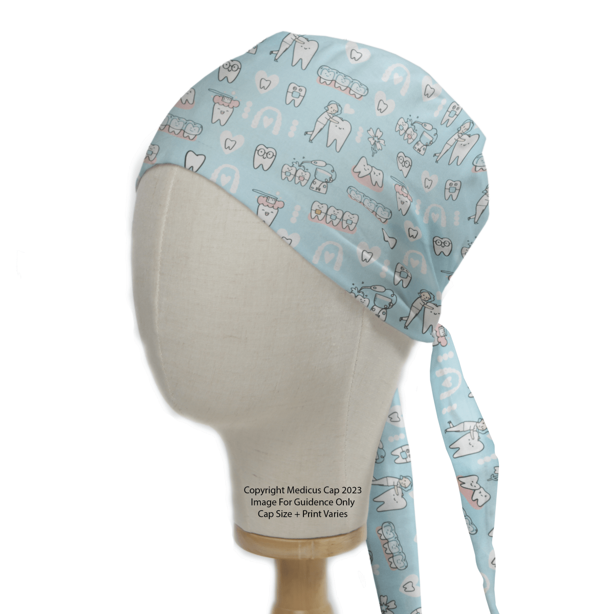 The Hygienist Teeth Cleaning Blue Scrub Cap by Medicus Scrub Caps is perfect for healthcare workers. It features a dental-themed print with teeth, toothbrushes, and tools in white and pink on light blue. Displayed on a mannequin head, it has adjustable ties at the back for hygienists.