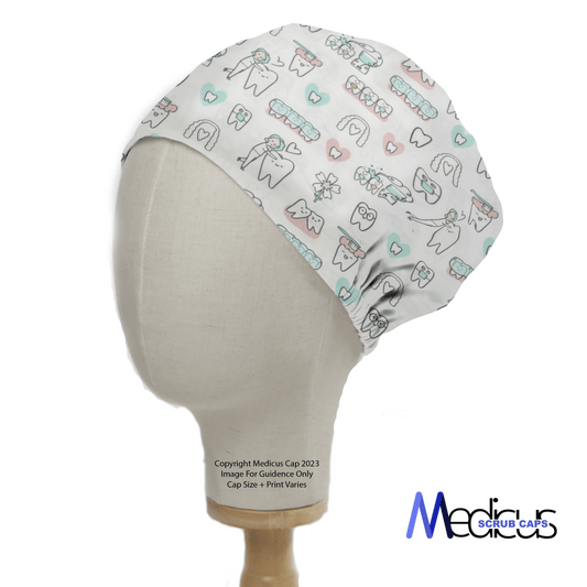 A mannequin head showcases the Hygienist Teeth Cleaning White Scrub Cap by Medicus Scrub Caps, featuring a dental-themed print with teeth, toothbrushes, tools, and hearts in blue, pink, and gray—ideal for dental professionals.