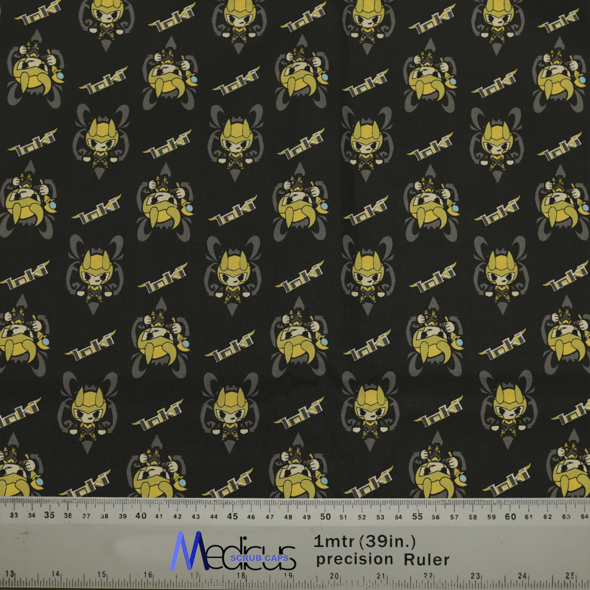 The LOKI Kawaii Scrub Cap by Medicus Scrub Caps features an eco-friendly patterned fabric with yellow cartoon cows wearing helmets and goggles on a black backdrop. A ruler at the bottom offers measurements in centimeters and inches for customizable designs.