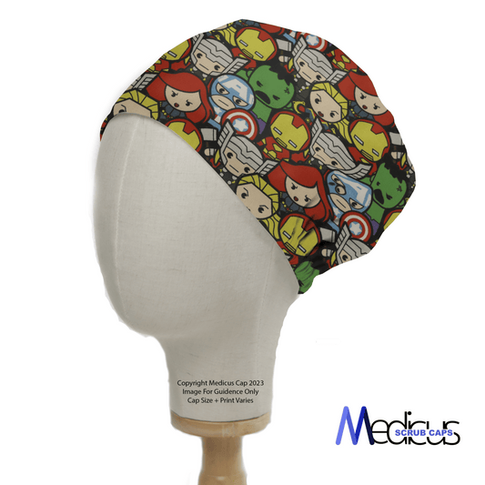 A mannequin head sports the vibrant Marvel Avengers Cartoon #2 Scrub Cap by Medicus Scrub Caps, showcasing superhero designs with helmets and faces. The logo in the lower right honors healthcare heroes with this eco-friendly choice.