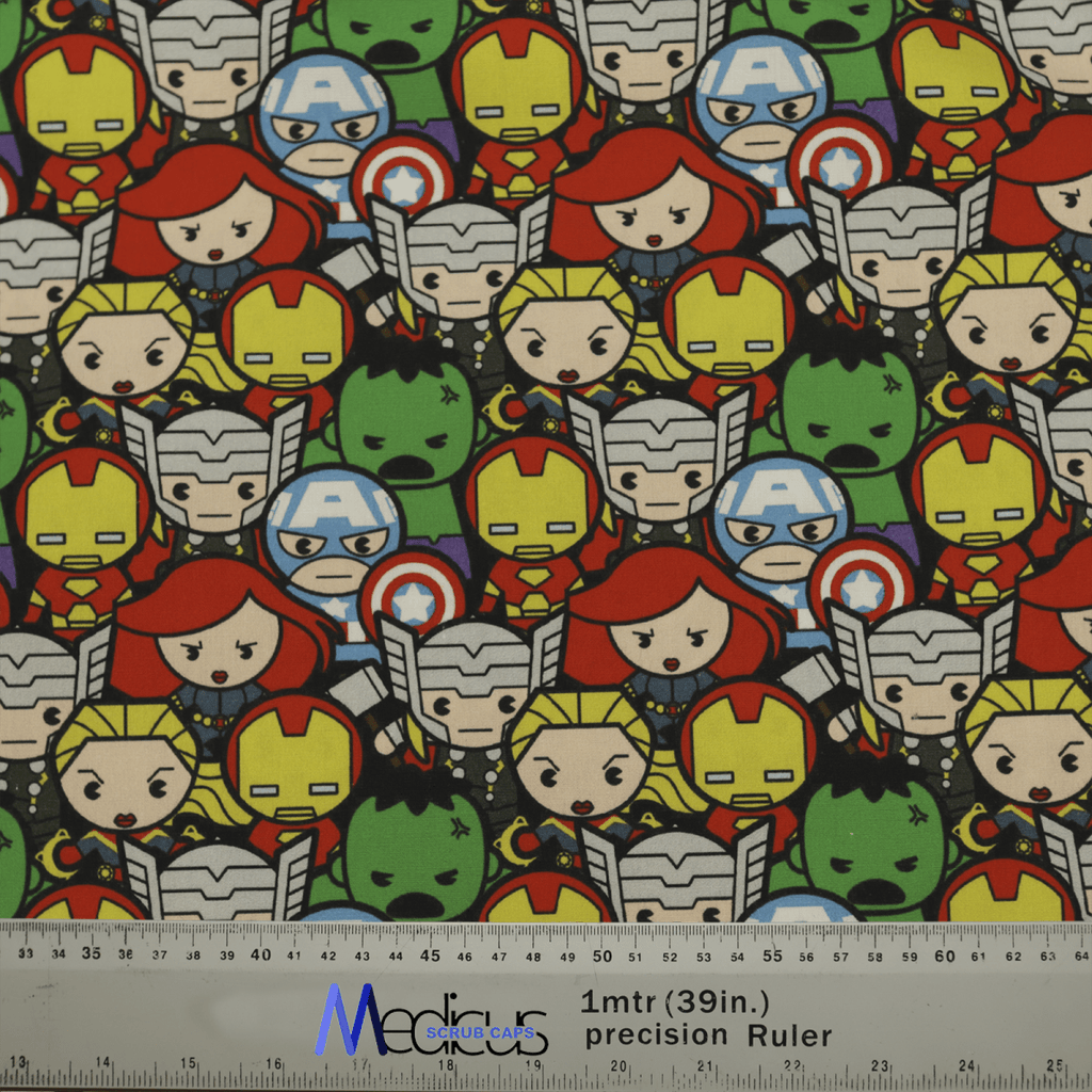 The Marvel Avengers Cartoon #2 Scrub Cap by Medicus Scrub Caps features chibi-style superheroes with exaggerated heads in colorful costumes forming a grid, ideal for any fan. A measurement ruler is displayed at the bottom of the image.