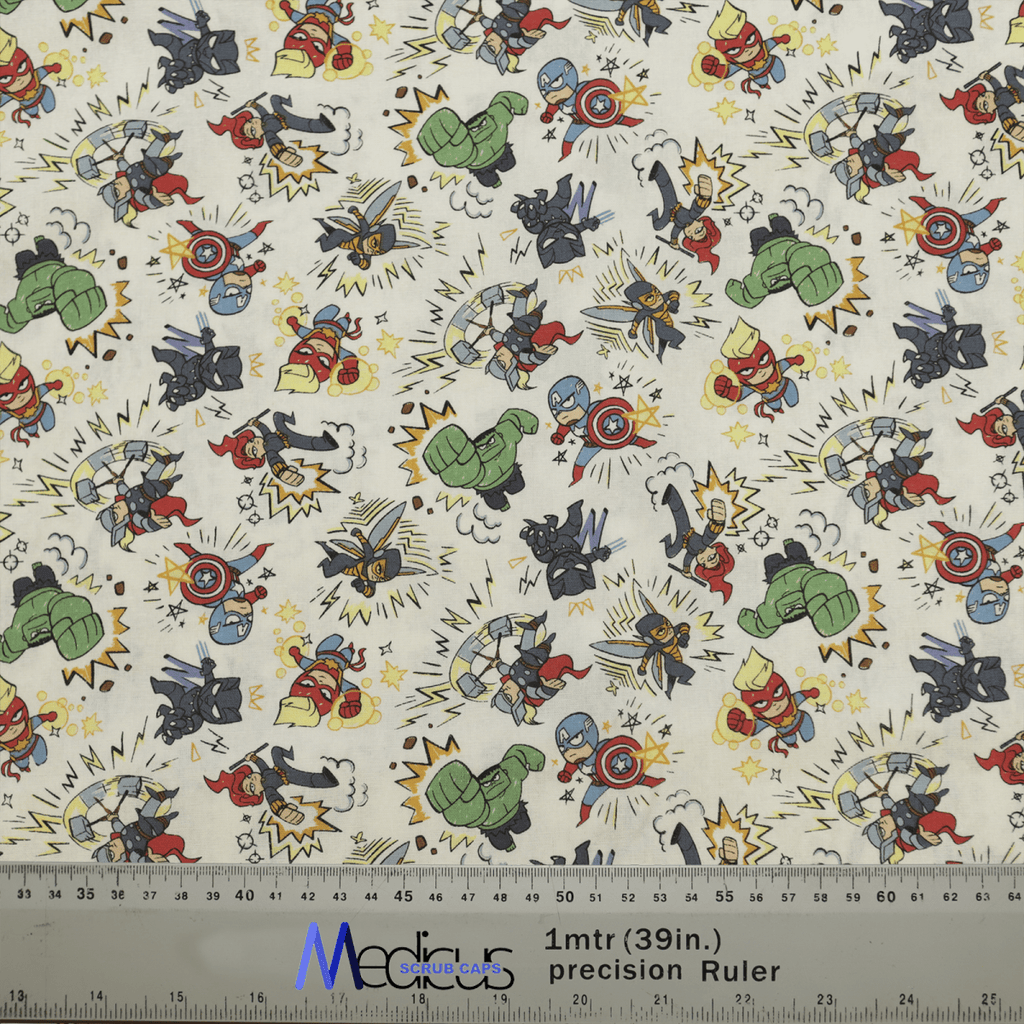 The Marvel Avengers Cartoon Fight Crowd fabric by Medicus Scrub Caps features superhero action poses, dynamic comic-style text like Boom! and Pow!, fists, and star symbols. Ideal for scrub caps, it includes a ruler at the bottom to show scale in meters and inches.