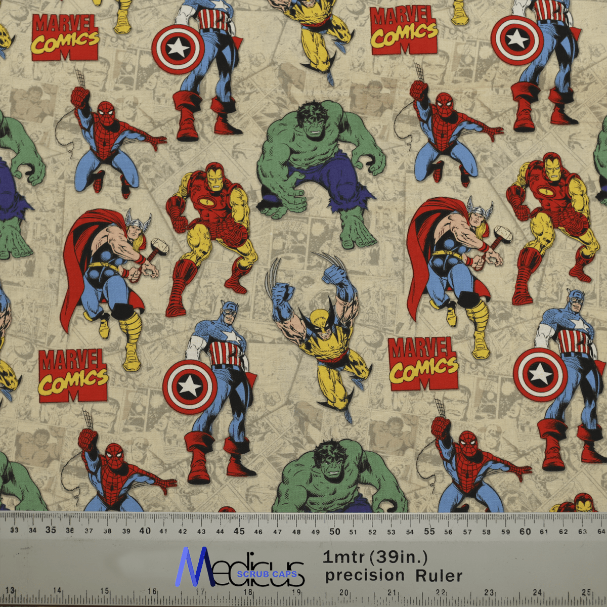 This eco-friendly fabric features Marvel superheroes like Spider-Man, Thor, and Iron Man on a beige background with comic strip designs. Perfect for crafting a Marvel Comics #5 Scrub Cap from Medicus Scrub Caps. A ruler at the bottom provides measurements in inches and centimeters.