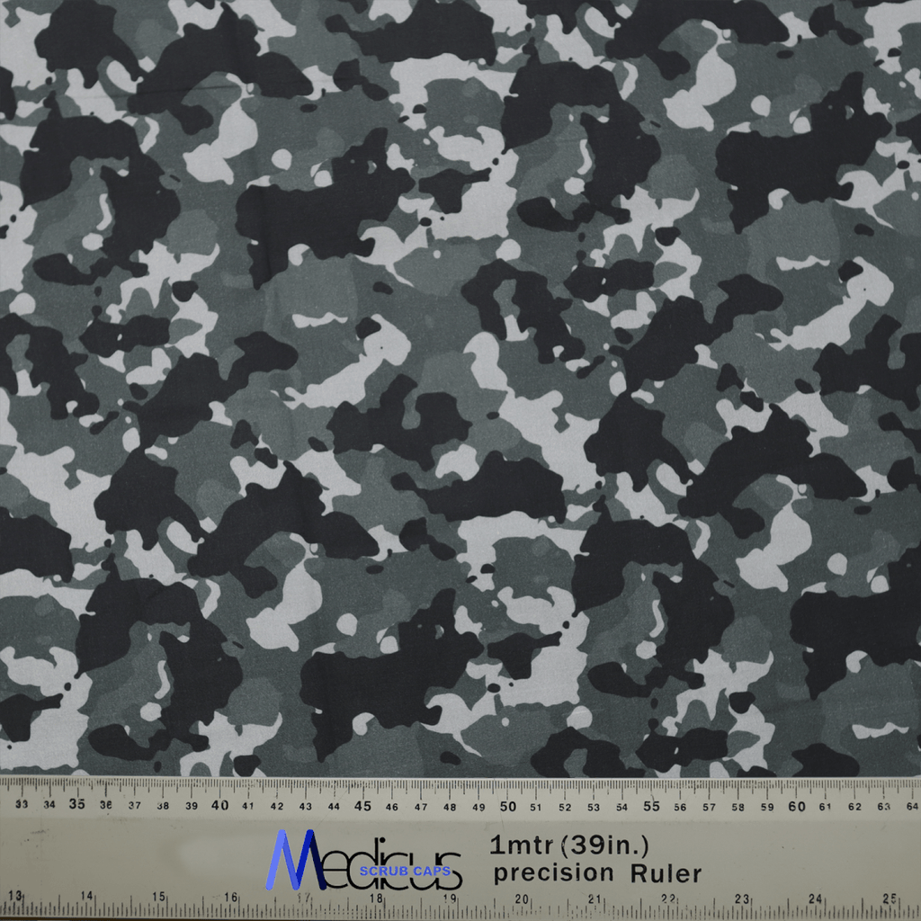 The Medicus Scrub Caps Military Camouflage Grey Scrub Cap features a black, grey, and white military pattern. A 1mtr (39in.) precision Ruler shows scale in inches and centimeters, perfect for crafting a stylish and comfortable cap for healthcare professionals.
