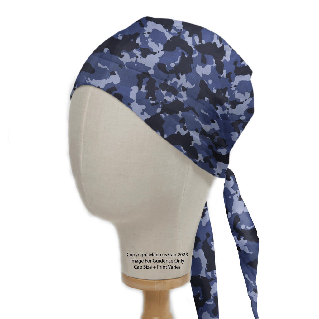 The Medicus Scrub Caps Military Camouflage Navy Scrub Cap, displayed on a mannequin head, features a tied back and blends dark blue, light blue, and black—perfect for healthcare professionals looking for style and fit.