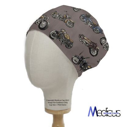 A mannequin head sports the Motorbike Vintage 1950 Scrub Cap with a retro motorcycle design on gray. Medicus Scrub Caps ensures eco-friendly quality with their logo clearly shown at the bottom right.