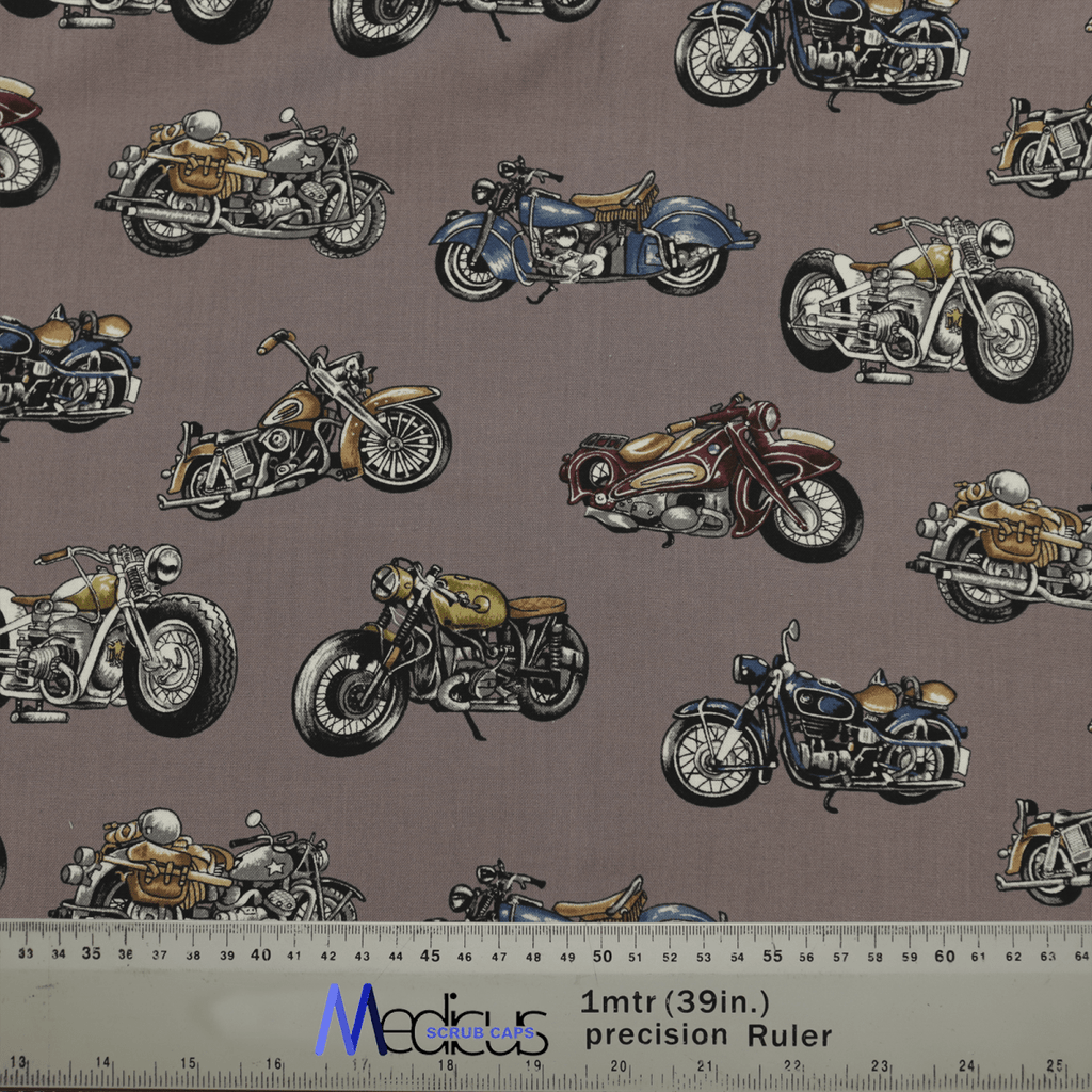 Explore the Medicus Scrub Caps high-quality Motorbike Vintage 1950 fabric, displaying colorful vintage motorcycles on a gray background. Ideal for an eco-friendly scrub cap, it includes a convenient ruler with centimeter and inch measurements.