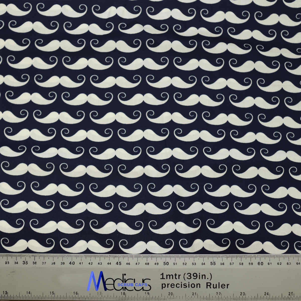Medicus Scrub Caps presents the Moustache Dark Blue Scrub Cap, featuring white mustaches on a dark blue background, ideal for medical style. A 1-meter (39 inches) ruler is displayed at the bottom for scale.