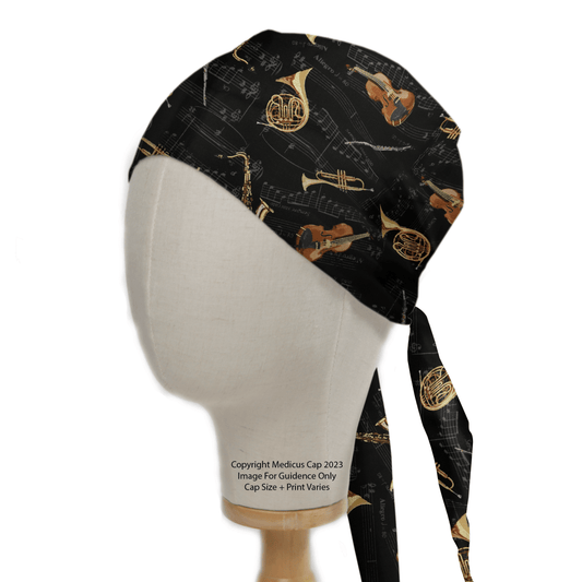 A mannequin head wears a black Musical Instruments Scrub Cap from Medicus Scrub Caps, decorated with golden instruments and sheet music. Featuring long ties and copyrighted in 2023, this personalized design adds artistic flair to eco-friendly medical wear.