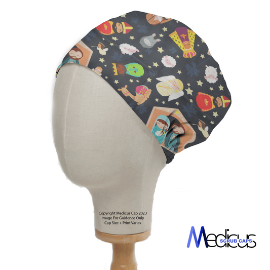 A mannequin head displays the Nativity Scene Christmas Scrub Cap, featuring healthcare-themed illustrations and small stars on a dark backdrop with colorful accents, encapsulating a festive spirit. The Medicus Scrub Caps logo is positioned at the bottom right.