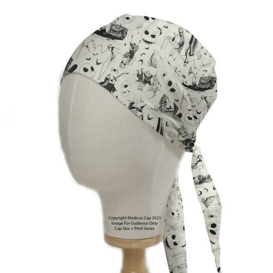 A Medicus Scrub Caps mannequin displays the Nightmare Before Christmas Scrub Cap, featuring a white base with cartoon skeleton faces, bats, and abstract shapes. Ideal for Halloween and eco-conscious fashionistas seeking stylish sustainability.