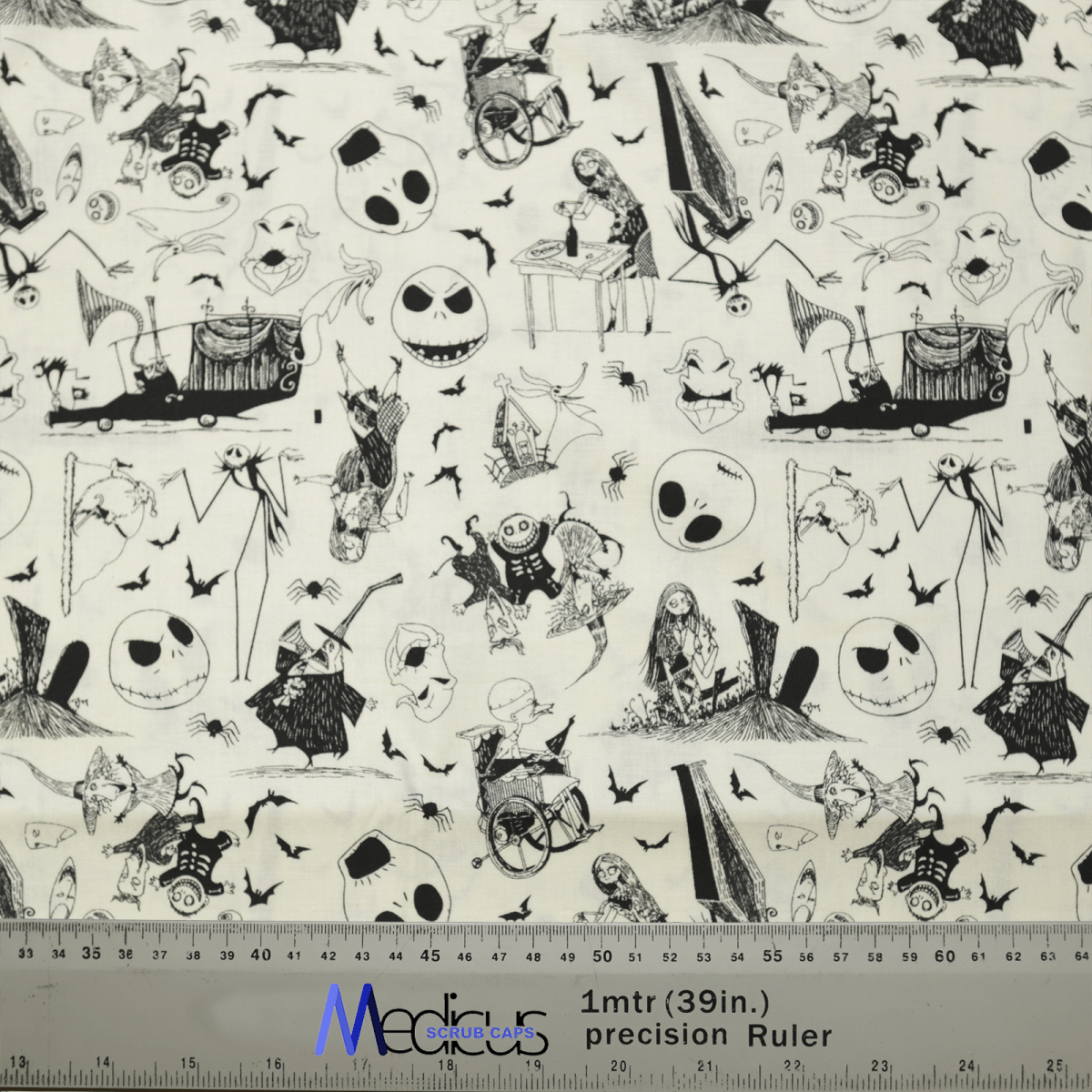 The Nightmare Before Christmas Scrub Cap by Medicus Scrub Caps is made from sustainable fabric, featuring black and white illustrations of skeletons, ghosts, and bats from a whimsical Halloween-themed movie. The reusable cap includes a ruler at the bottom with inches and centimeters measurements.