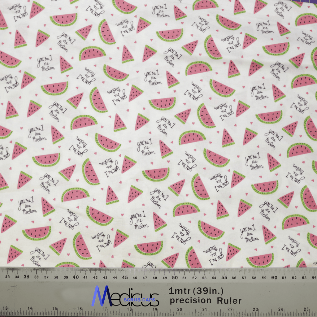 The Pun-tastic: 1 in a Melon Scrub Cap by Medicus Scrub Caps features an eco-friendly, white patterned fabric with watermelon slices and phrases like youre one in a melon, accented in pink, green, and black. It supports healthcare workers and includes measurements with logos at the bottom.
