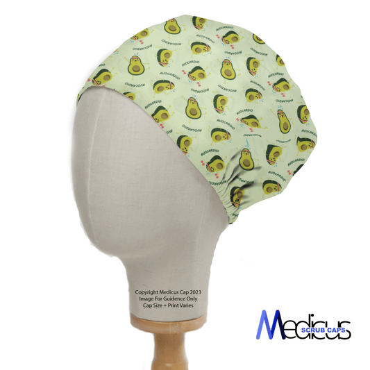 The mannequin head wears the Pun-tastic: Avo-cardio Scrub Cap by Medicus Scrub Caps, ideal for healthcare professionals. Featuring a vibrant avocado print with MEDICUS text and a Medicus Scrub Caps logo on the bottom right, its an eco-friendly blend of style and utility.