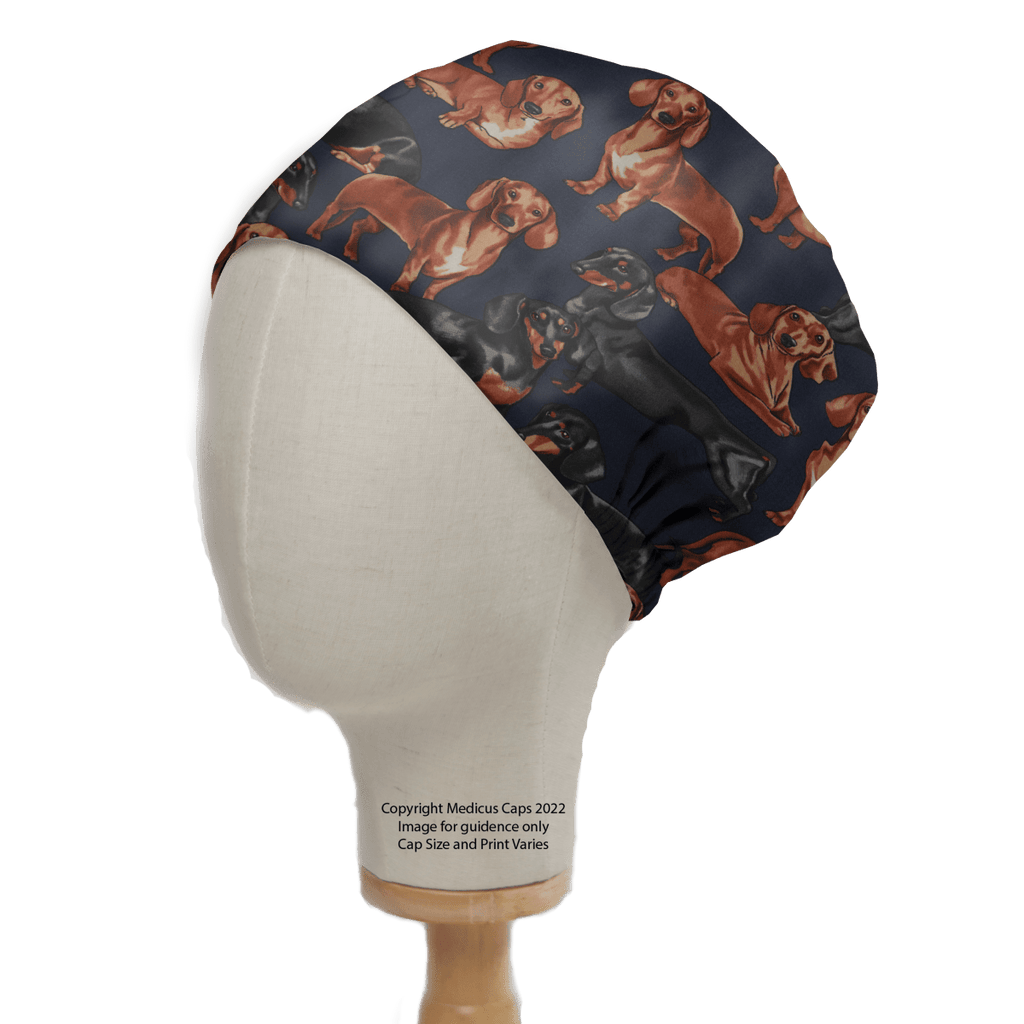 The Medicus Scrub Caps Sausage Dachshund Dog Scrub Cap features a navy background with prints of brown and black sausage dachshunds in various poses—ideal for healthcare professionals.