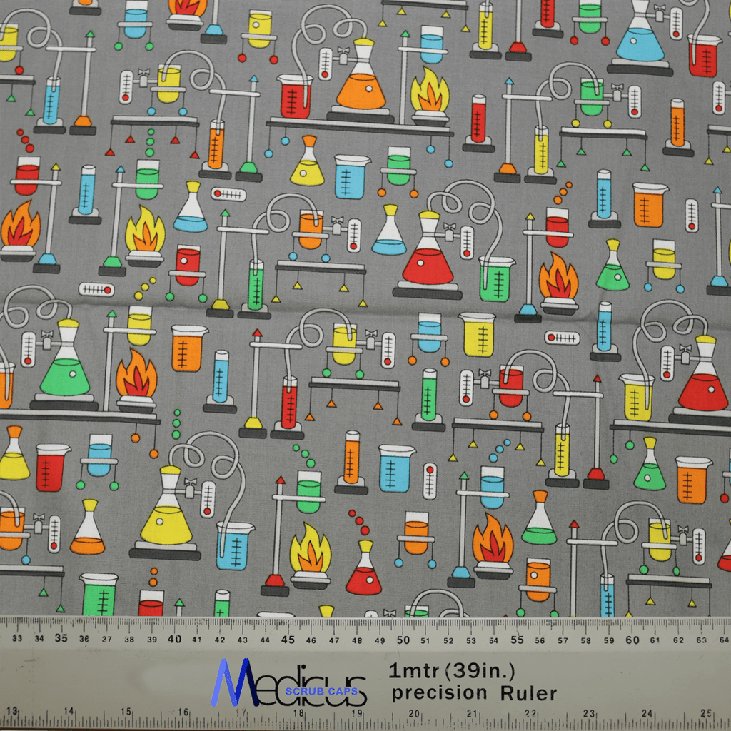 This eco-friendly Medicus Science Bunsen Burners Scrub Cap fabric features colorful lab equipment, such as beakers and flasks, on a gray background. It includes a ruler for scale, measuring one meter or 39 inches. Perfect for a scrub hat!.