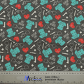 The Scrub Life Scrub Cap by Medicus Scrub Caps features a teal scrub pattern with red hearts, lifelines, stethoscopes, and SCRUB LIFE text on a dark background—a tribute to healthcare professionals. A ruler for scale is included at the bottom.