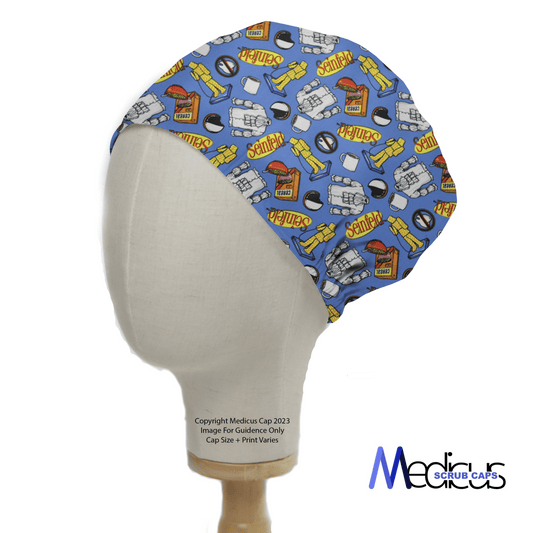 The Seinfeld Breakfast Blue Scrub Cap by Medicus Scrub Caps features comic book-style illustrations like Krypton, a spaceship, and retro designs. Ideal for healthcare professionals, it merges style with sustainability and is displayed on a mannequin head. Branding reads Medicus Scrub Caps.