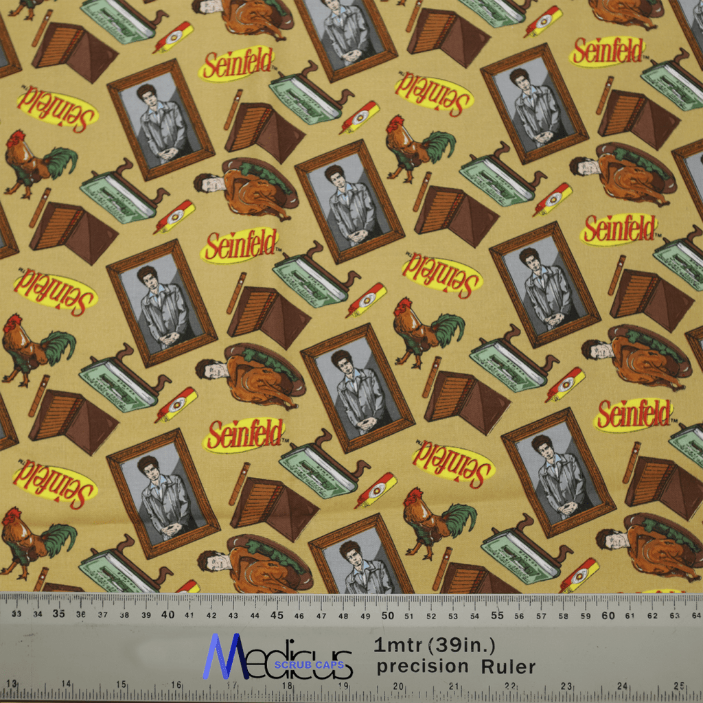 The Medicus Scrub Caps Seinfeld Wallpaper Scrub Cap showcases a pattern of a suited man, retro TVs, typewriters, bananas, and chickens. It ensures comfort with a gray ruler at the bottom displaying metric and imperial units against a beige background for an environmentally responsible design.