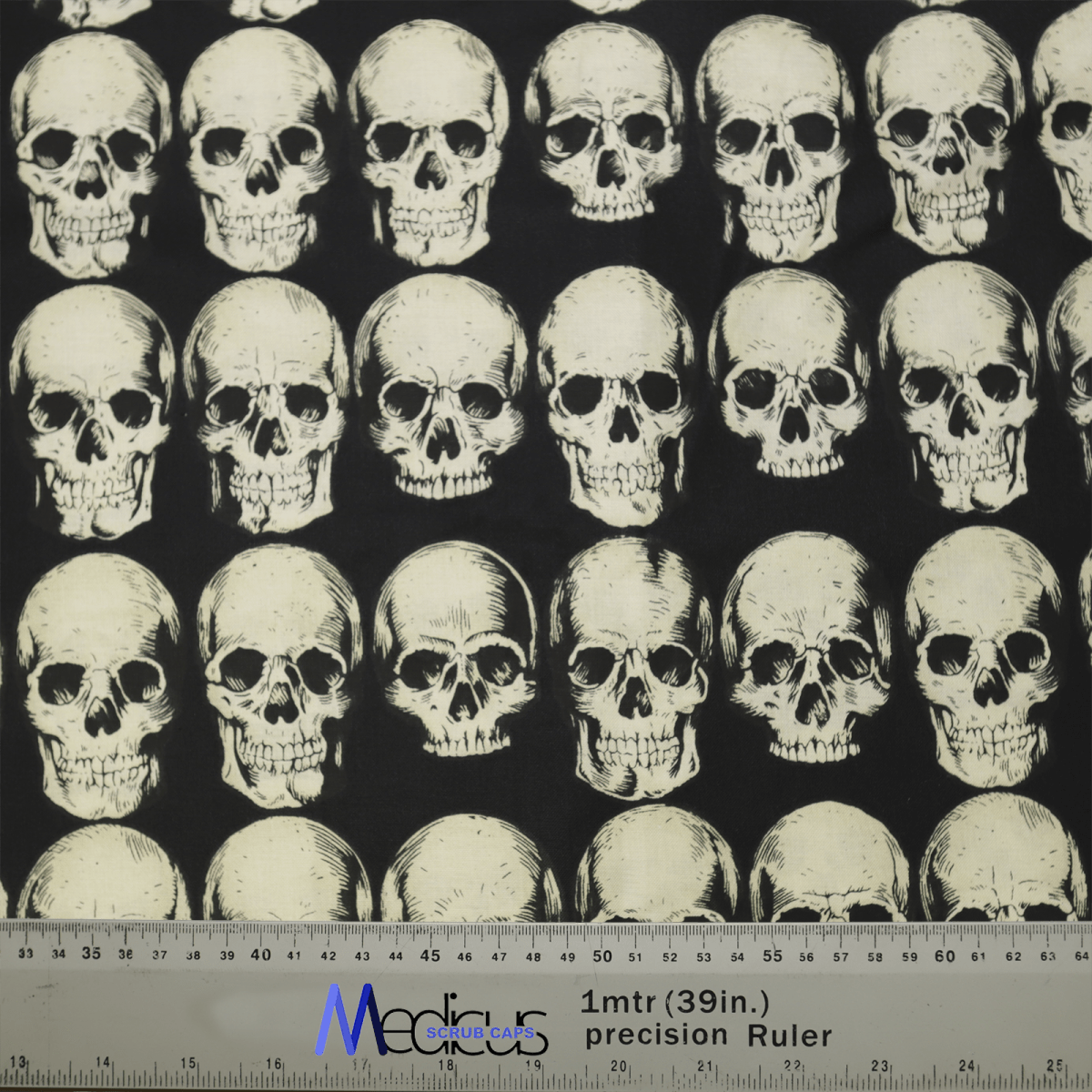 Patterned fabric with vintage-style white skulls on dark grey is ideal for Medicus Scrub Caps Skulls On Dark Grey Scrub Cap. A precision ruler at the bottom, marked 1 mtr (39 in.), ensures professional functionality.
