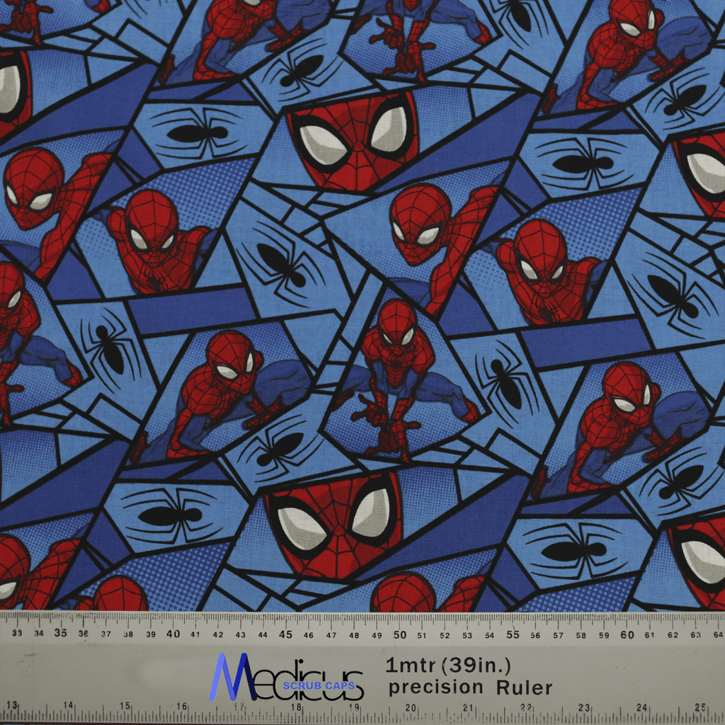The Spiderman Comic Web Grid Scrub Cap by Medicus Scrub Caps features blue fabric with Spider-Man in various poses, spider web designs, and black spiders, ideal for a reusable scrub cap. A ruler at the bottom indicates scale at 1 meter or 39 inches.