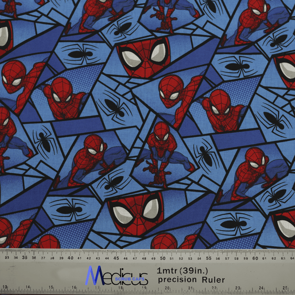 The Spiderman Comic Web Grid Scrub Cap by Medicus Scrub Caps features blue fabric with Spider-Man in various poses, spider web designs, and black spiders, ideal for a reusable scrub cap. A ruler at the bottom indicates scale at 1 meter or 39 inches.