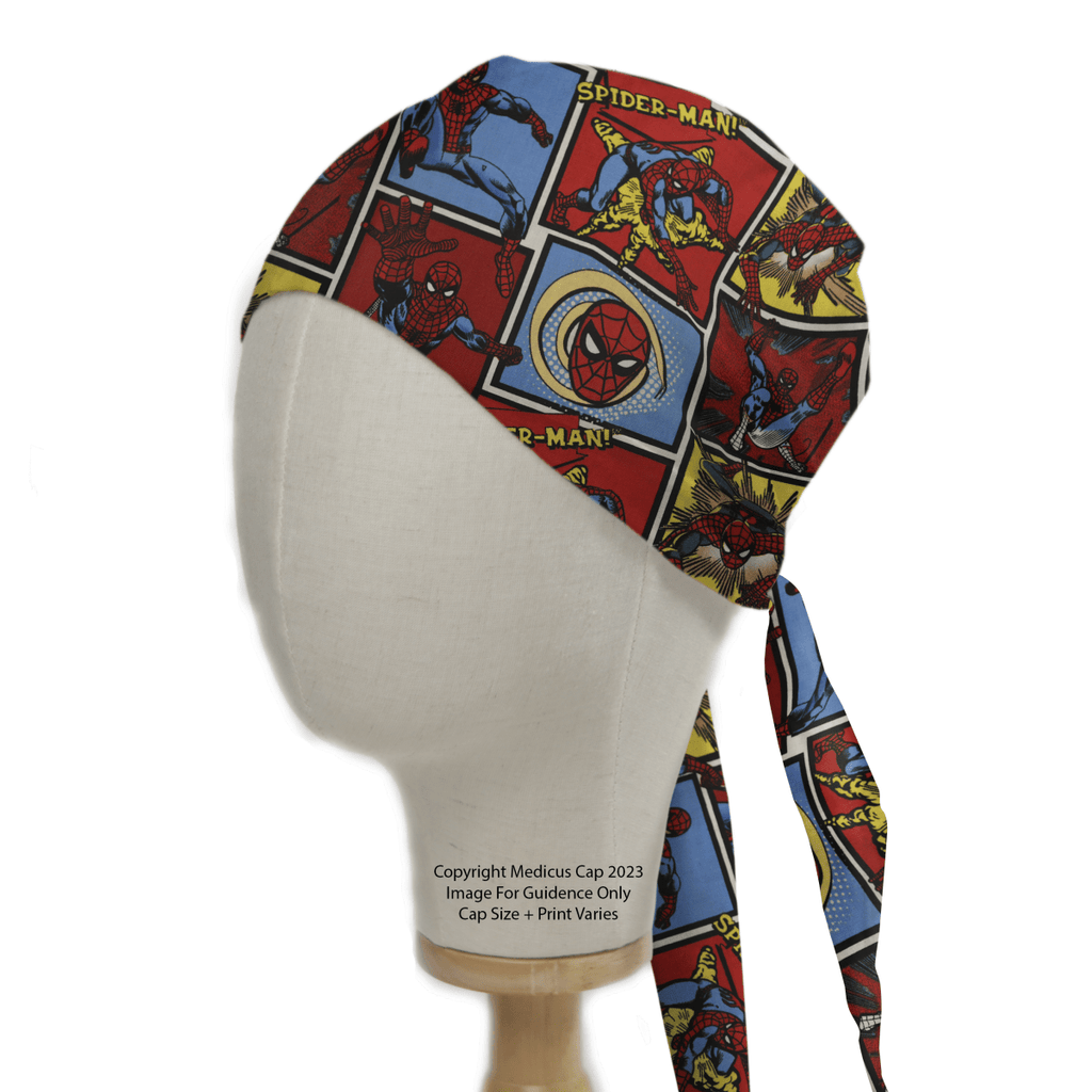 A Medicus Scrub Caps mannequin head wears the Spiderman Marvel Comic Book Style scrub cap, featuring vibrant Spider-Man illustrations in dynamic action poses set against a lively red, blue, and yellow backdrop.