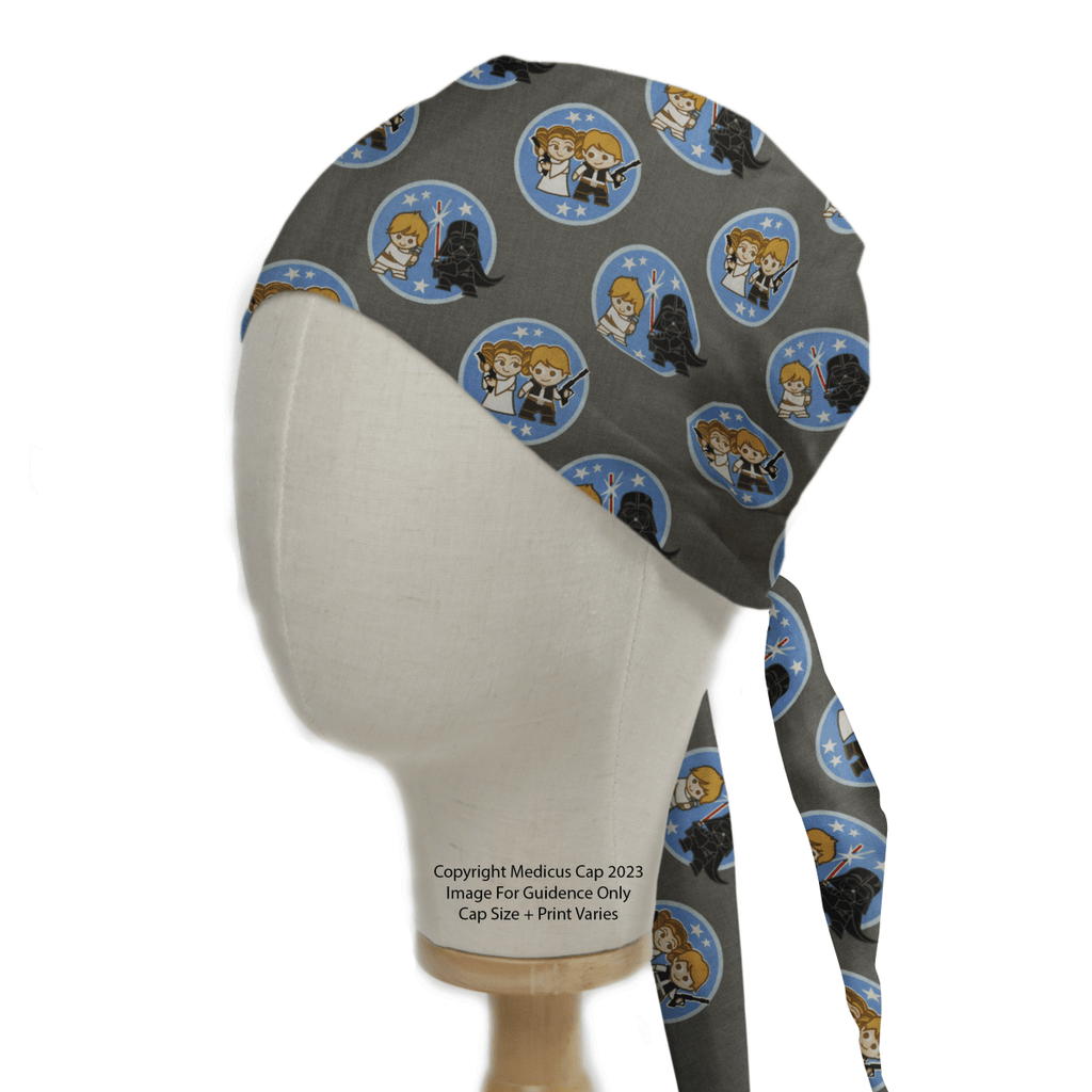 The Star Wars Kawaii Character Pairs on Grey Scrub Cap by Medicus features adorable cartoon designs, comfortably fitted on a mannequin head.