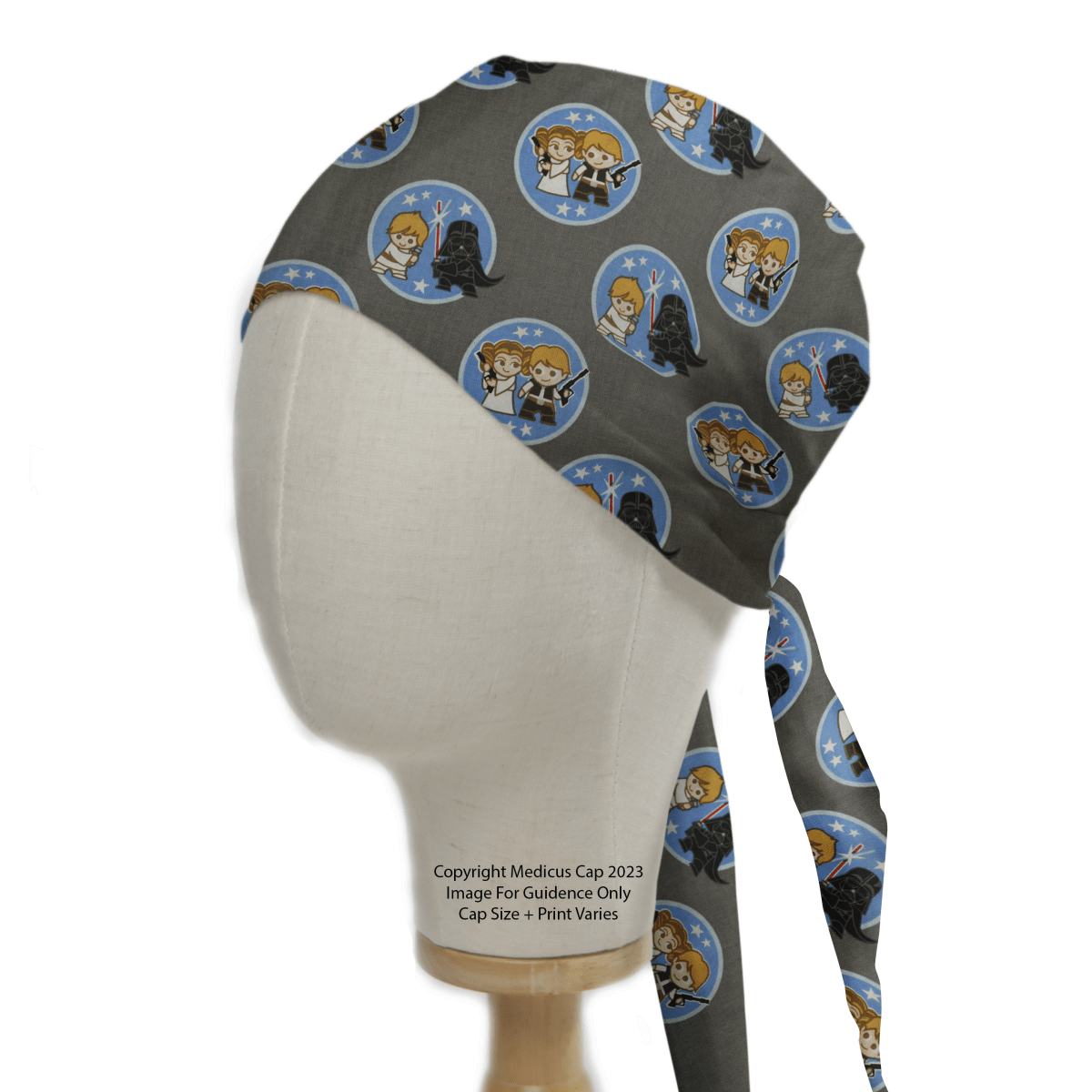 The Star Wars Kawaii Character Pairs on Grey Scrub Cap by Medicus features adorable cartoon designs, comfortably fitted on a mannequin head.