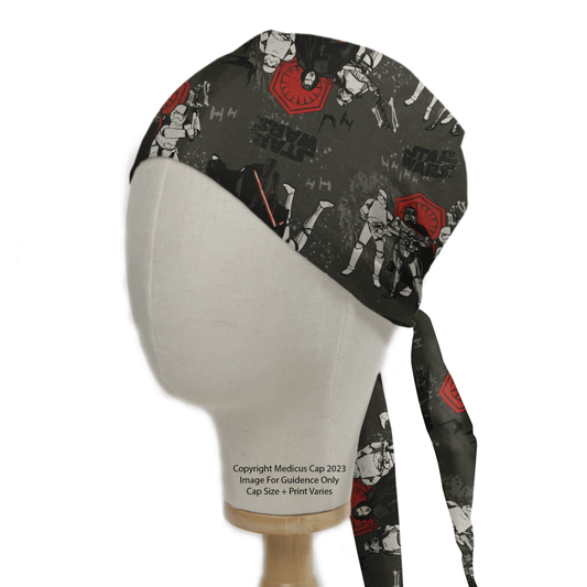 A mannequin displays the Medicus Scrub Caps Star Wars Last Jedi Scrub Cap, featuring a dark fabric with stormtroopers and red emblems. Its tied-back design adds professional functionality, perfect for any Star Wars fan wanting to infuse their work attire with the Force.