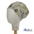 A mannequin head wears the Star Wars Original Kawaii Scrub Cap by Medicus Scrub Caps, showcasing cute cartoon characters and robots. This reusable cap is ideal for fans wanting style and functionality, with the brands logo at the bottom right.