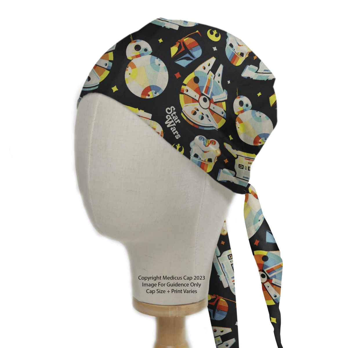 A mannequin head displays a Star Wars Pride Spaceships Scrub Cap by Medicus Scrub Caps, featuring a colorful spaceship design on a black background with tie-back closure.
