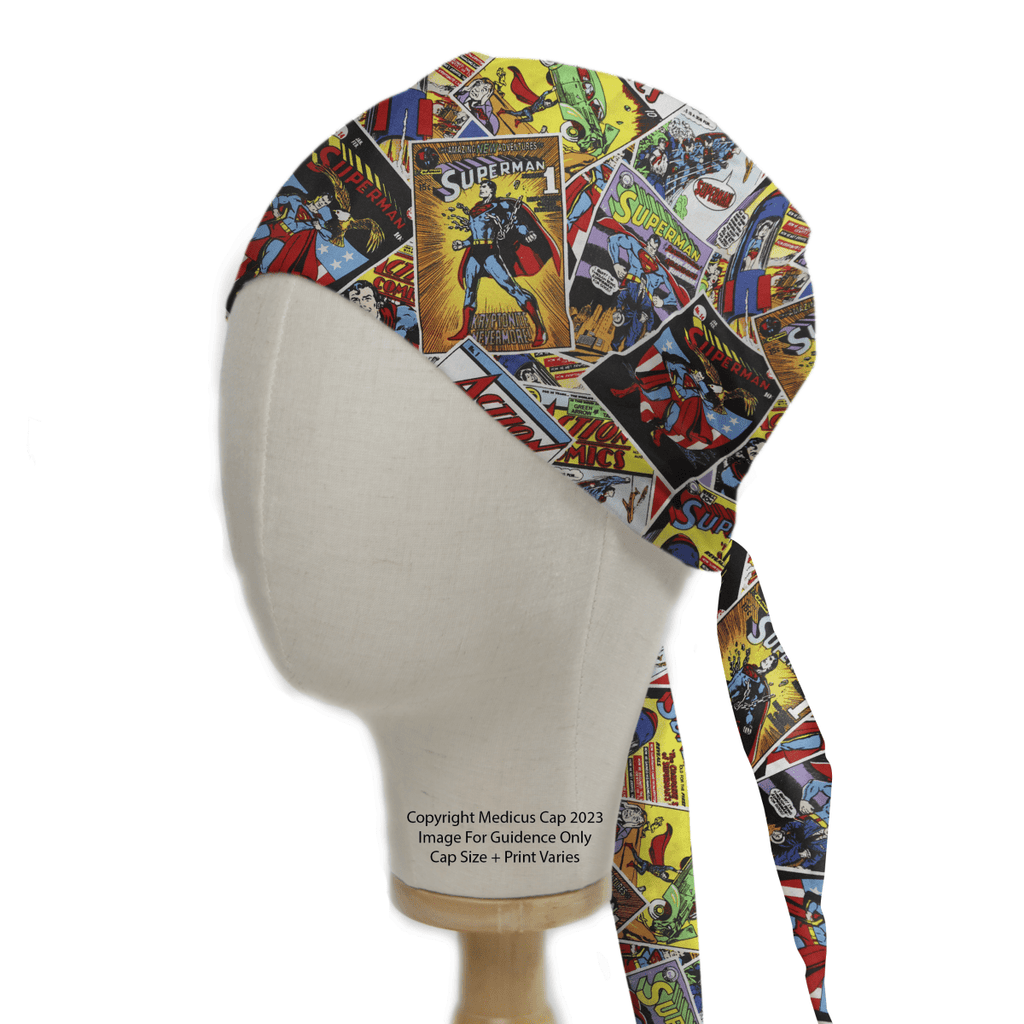 A mannequin head displays the reusable Superman Comic Book Covers Scrub Cap by Medicus Scrub Caps, featuring superhero graphics and action scenes with vibrant images and text in a dynamic collage style.