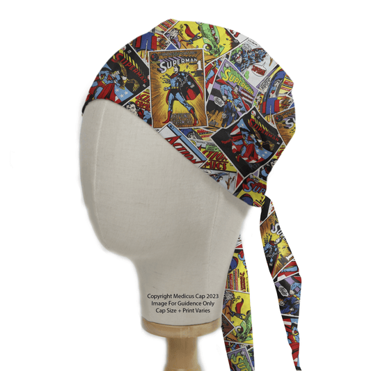 A mannequin head displays the reusable Superman Comic Book Covers Scrub Cap by Medicus Scrub Caps, featuring superhero graphics and action scenes with vibrant images and text in a dynamic collage style.