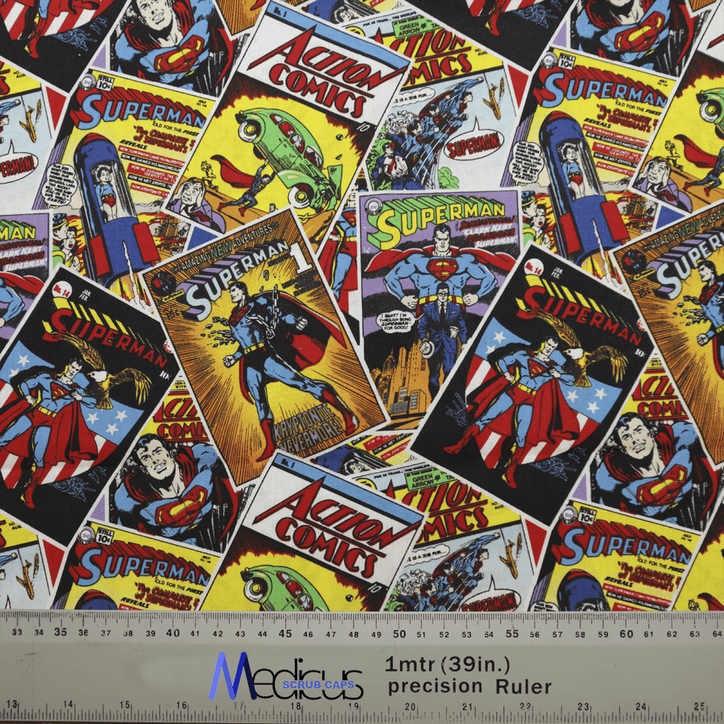 The Medicus Scrub Caps Superman Comic Book Covers Scrub Cap features vintage action scenes and iconic imagery on a ruler background marked 1m (39in) precision, ideal for reusable displays or superhero-themed inspiration.