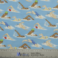 The Swimmers Scrub Cap from Medicus Scrub Caps features patterned fabric with swimmers in various strokes on a blue background, showcasing people in swim caps and goggles. Its ideal for crafting stylish scrub caps for healthcare professionals, with a measuring ruler visible in the image.
