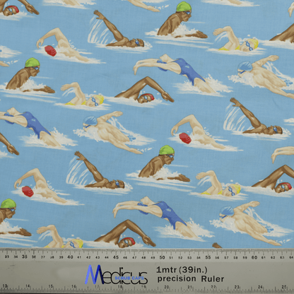 The Swimmers Scrub Cap from Medicus Scrub Caps features patterned fabric with swimmers in various strokes on a blue background, showcasing people in swim caps and goggles. Its ideal for crafting stylish scrub caps for healthcare professionals, with a measuring ruler visible in the image.