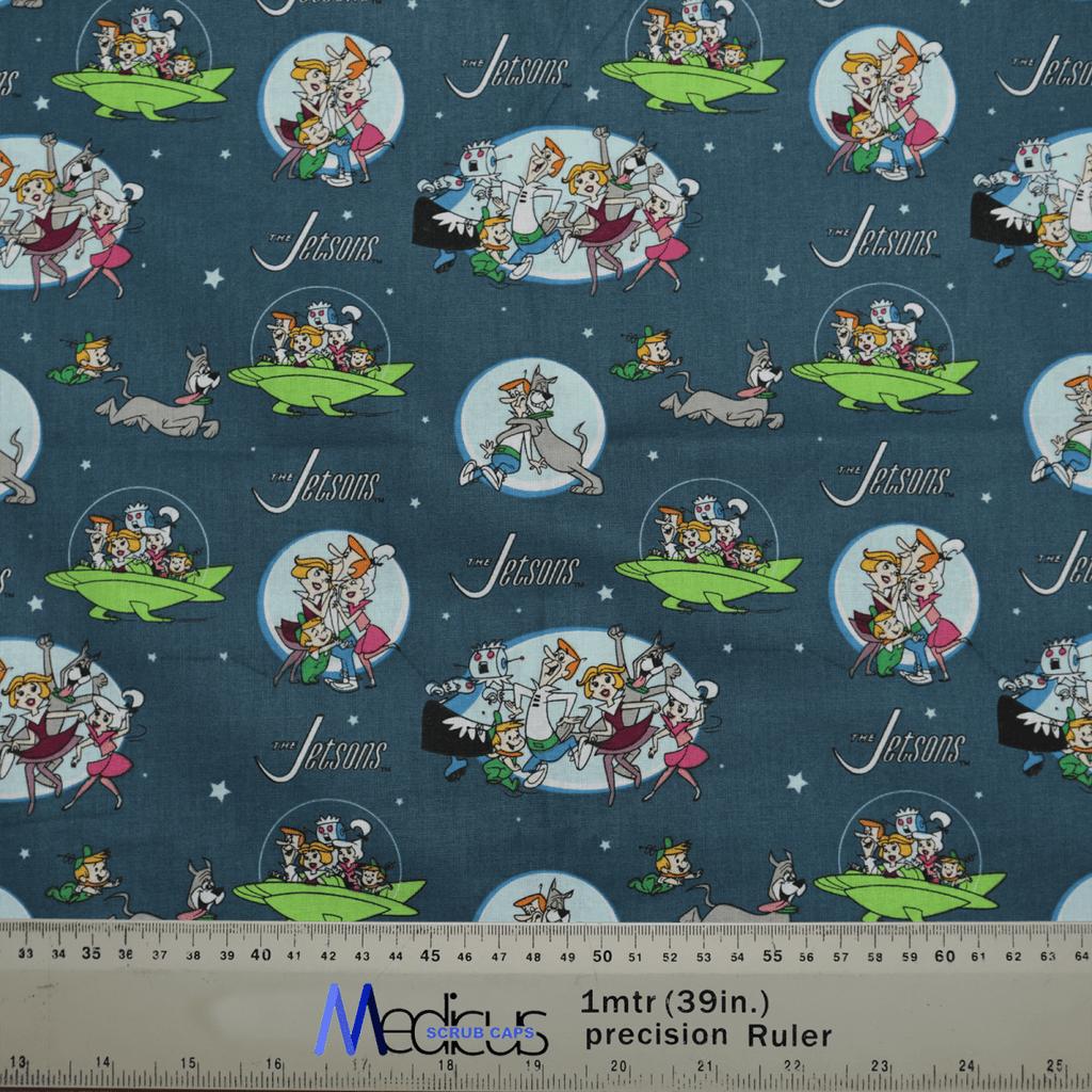The Jetsons Family Scrub Cap by Medicus Scrub Caps boasts a retro-futuristic design, featuring cartoon scenes of the Jetsons Family and their dog in flying cars, with moons and stars adding whimsy. A ruler on the bottom offers measurements, making it reusable and perfect for any fan.