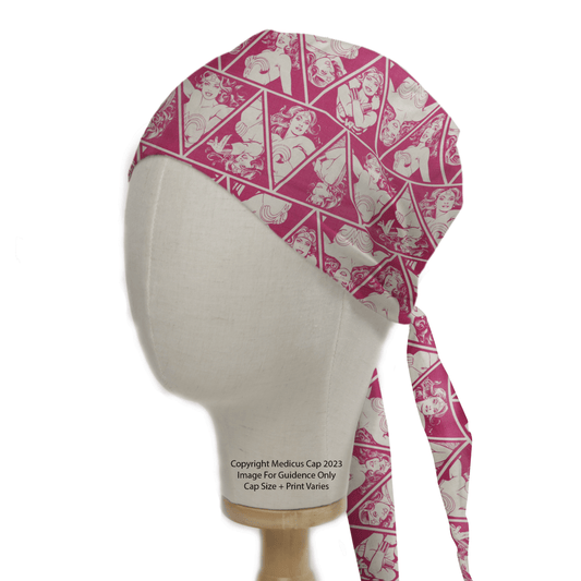 Displayed on a mannequin, the Medicus Scrub Caps Wonder Woman Pink Diamonds Scrub Cap features white triangles and cartoon characters. Ideal for healthcare professionals, it has long ties for adjustable fit and embodies empowerment.